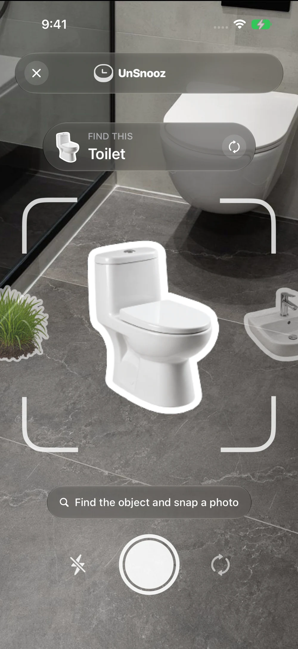 UnSnooz Object Hunt camera with a toilet target and photo button